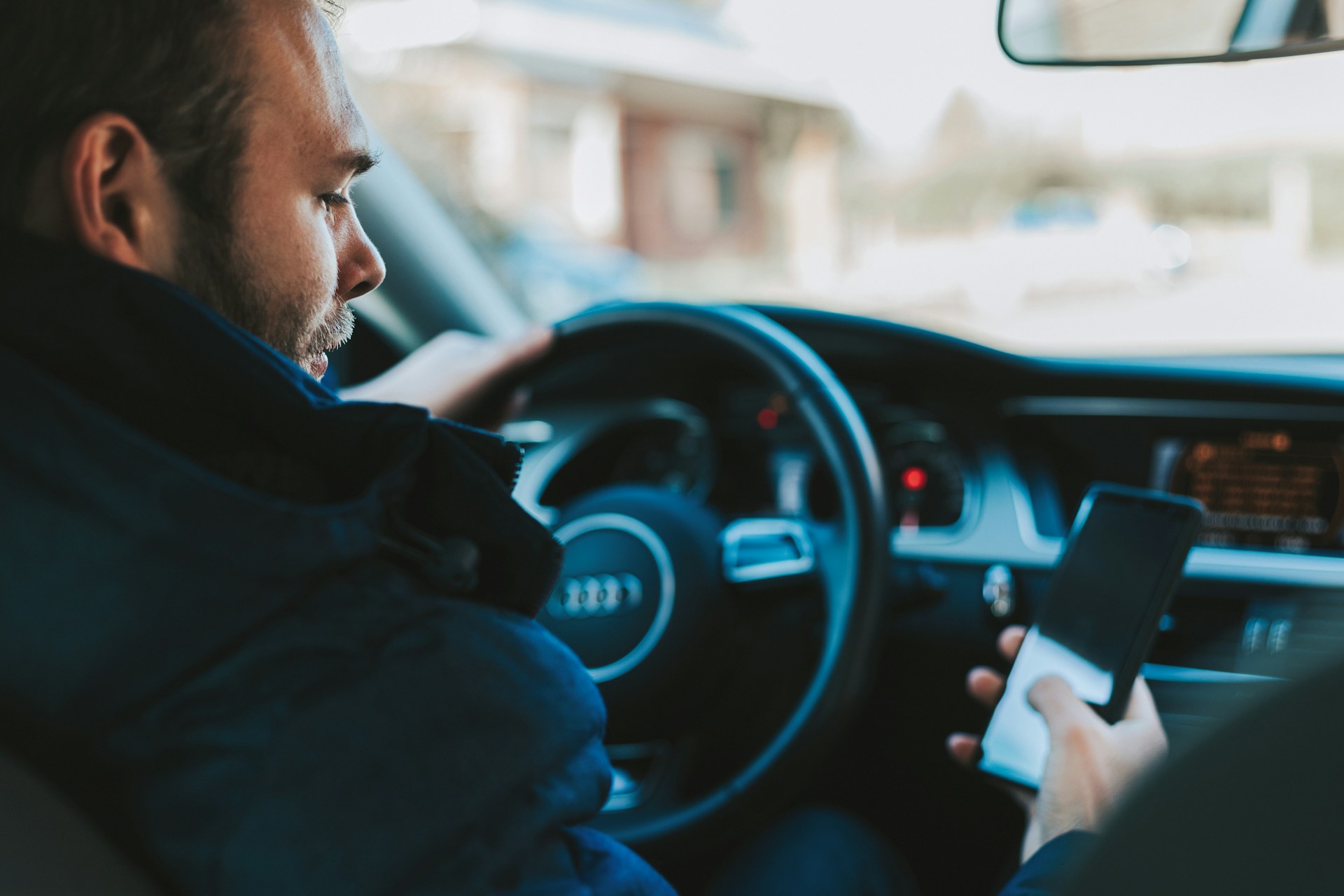 driver error; checking phone will driving